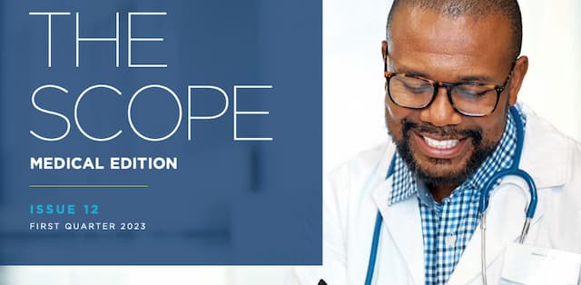 doctor wearing white coat takes notes on a clipboard