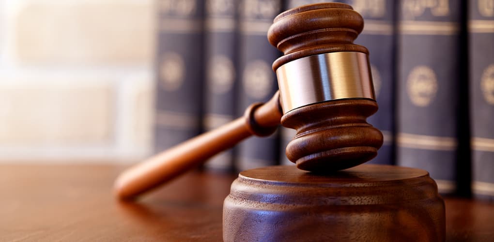 Image shows a gavel to introduce this blog on an adverse treatment case study