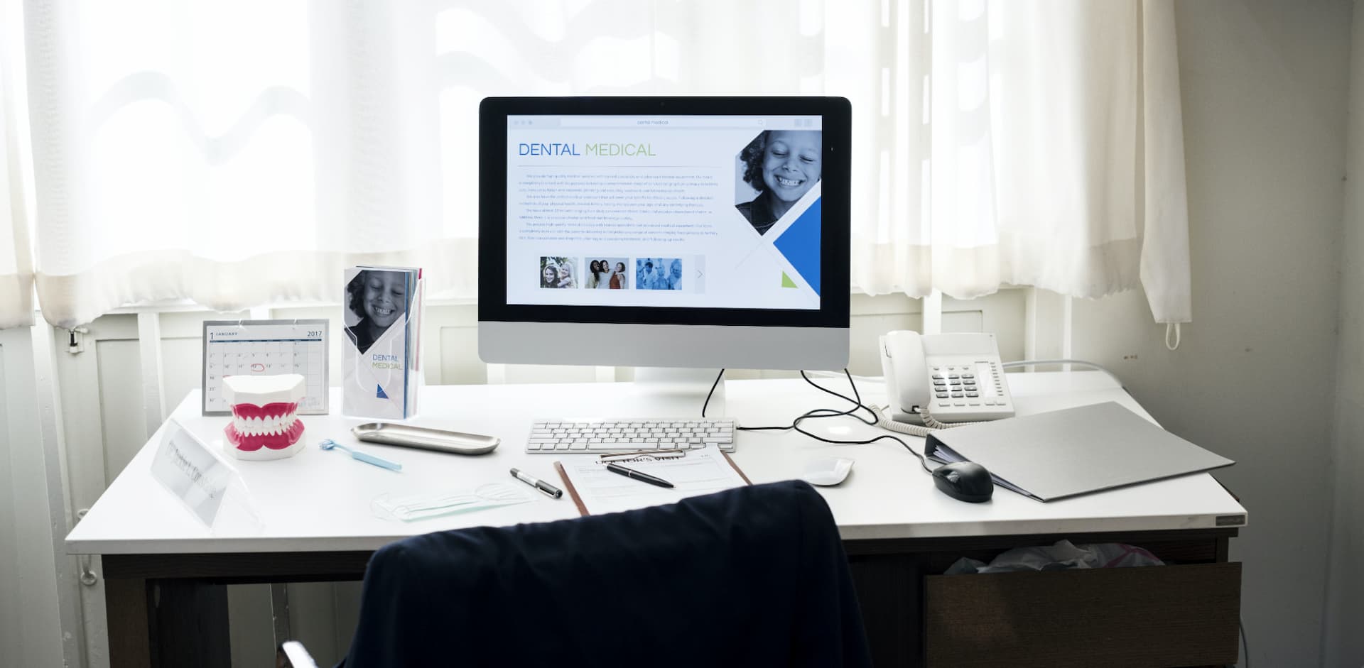 Photo of a computer in a dental office for the mlmic renewal update