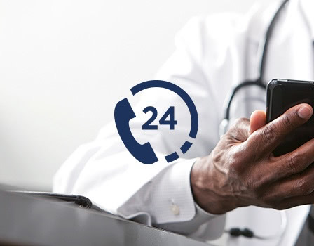 Doctor using cell phone | Risk Management support