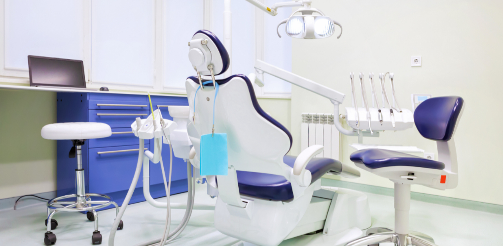 Image shows a dental setup which highlights the various forms of technology that's used in dental practices.
